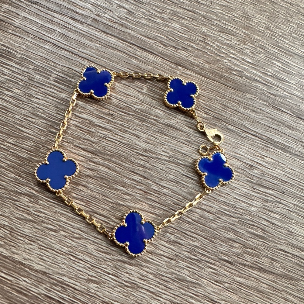 Van Cleef & Arpels Gold Bracelet with Blue Clover Charms